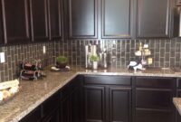 Dark Cabinets with Light Backsplash Showhouse counters herringbone haven soapstone houseminds travertine