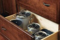 kitchen cabinets pots and pans drawer Custom pot and pan drawer cabinet under range top. top drawer holds