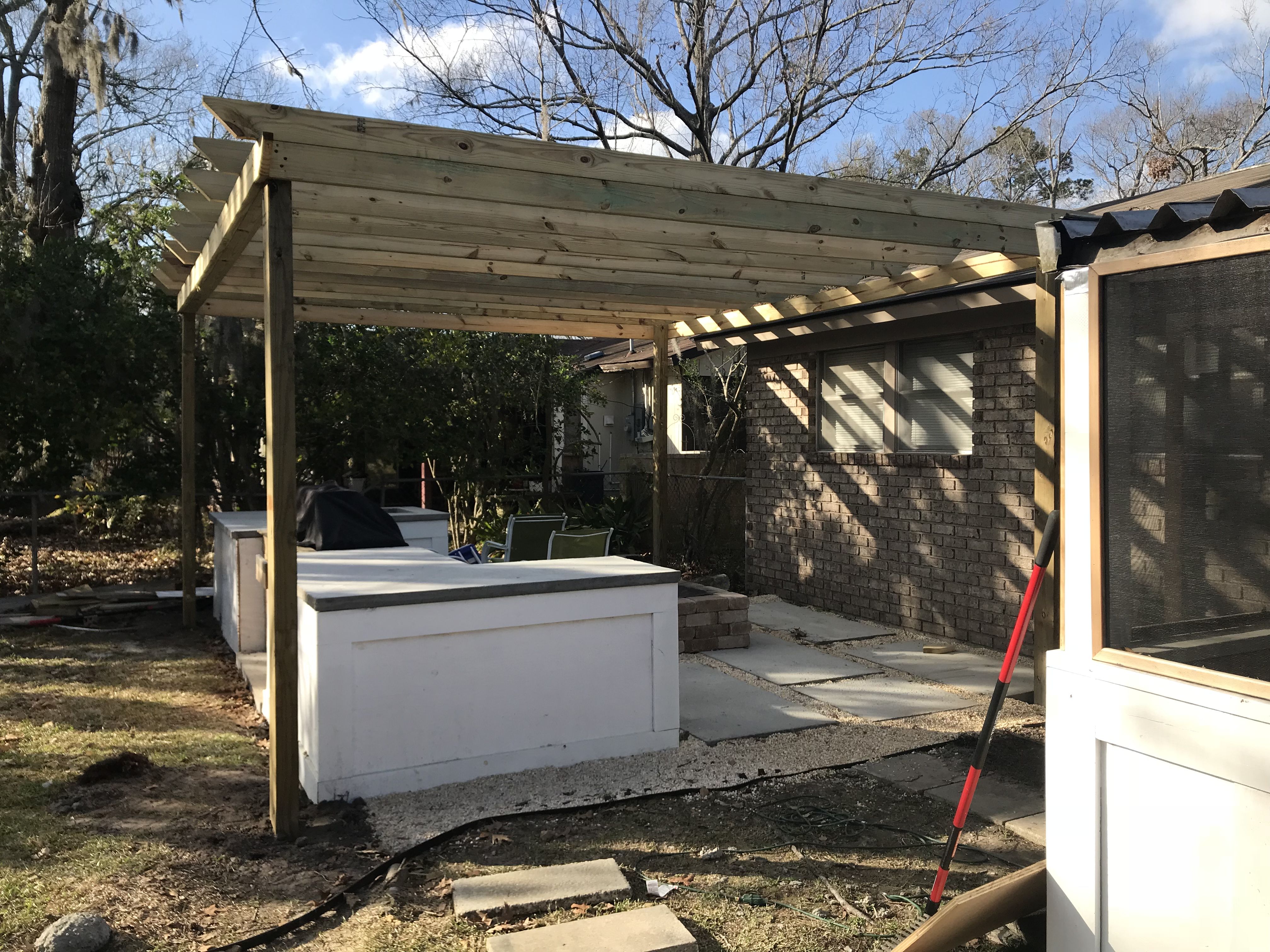 Patio, pergola, built-in grill, poured concrete counters | Outdoor