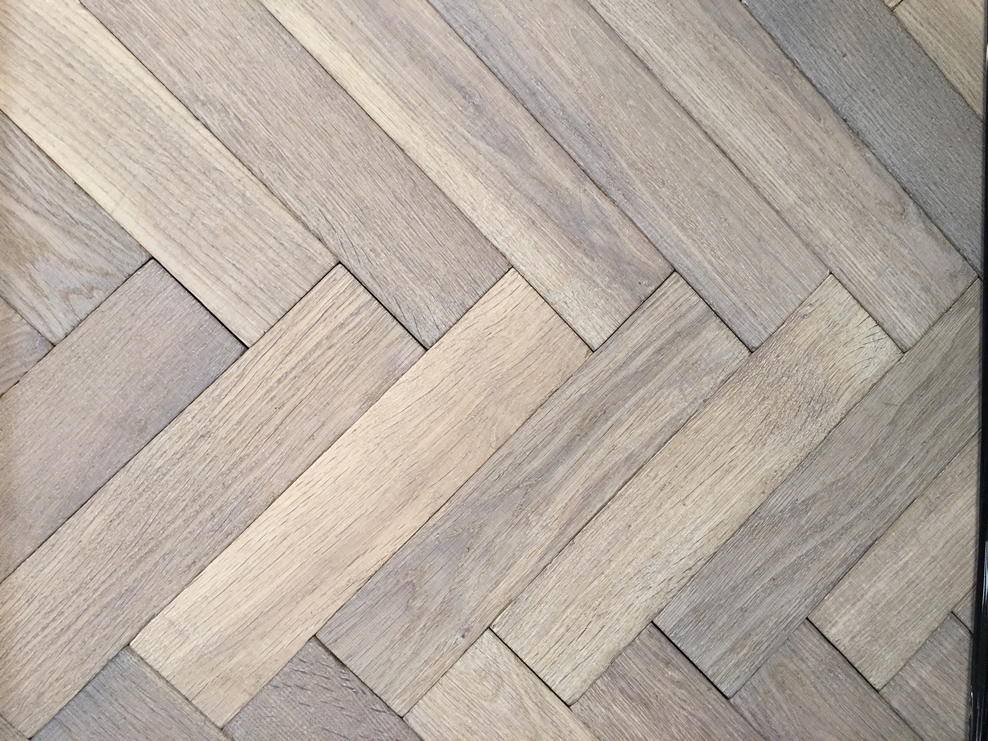 About: Traditional Grey Oak European Herringbone