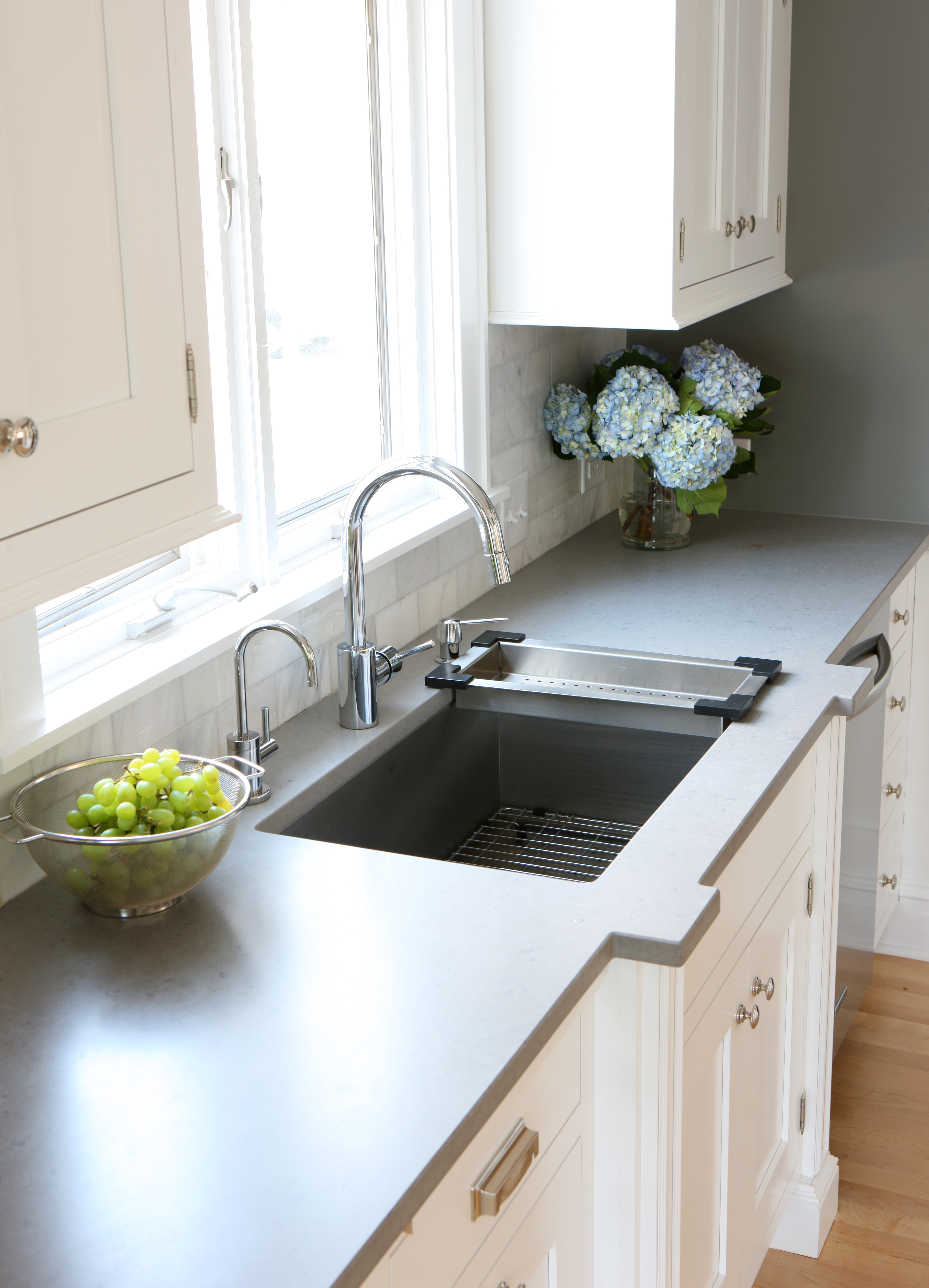 White kitchen with honed Countertop